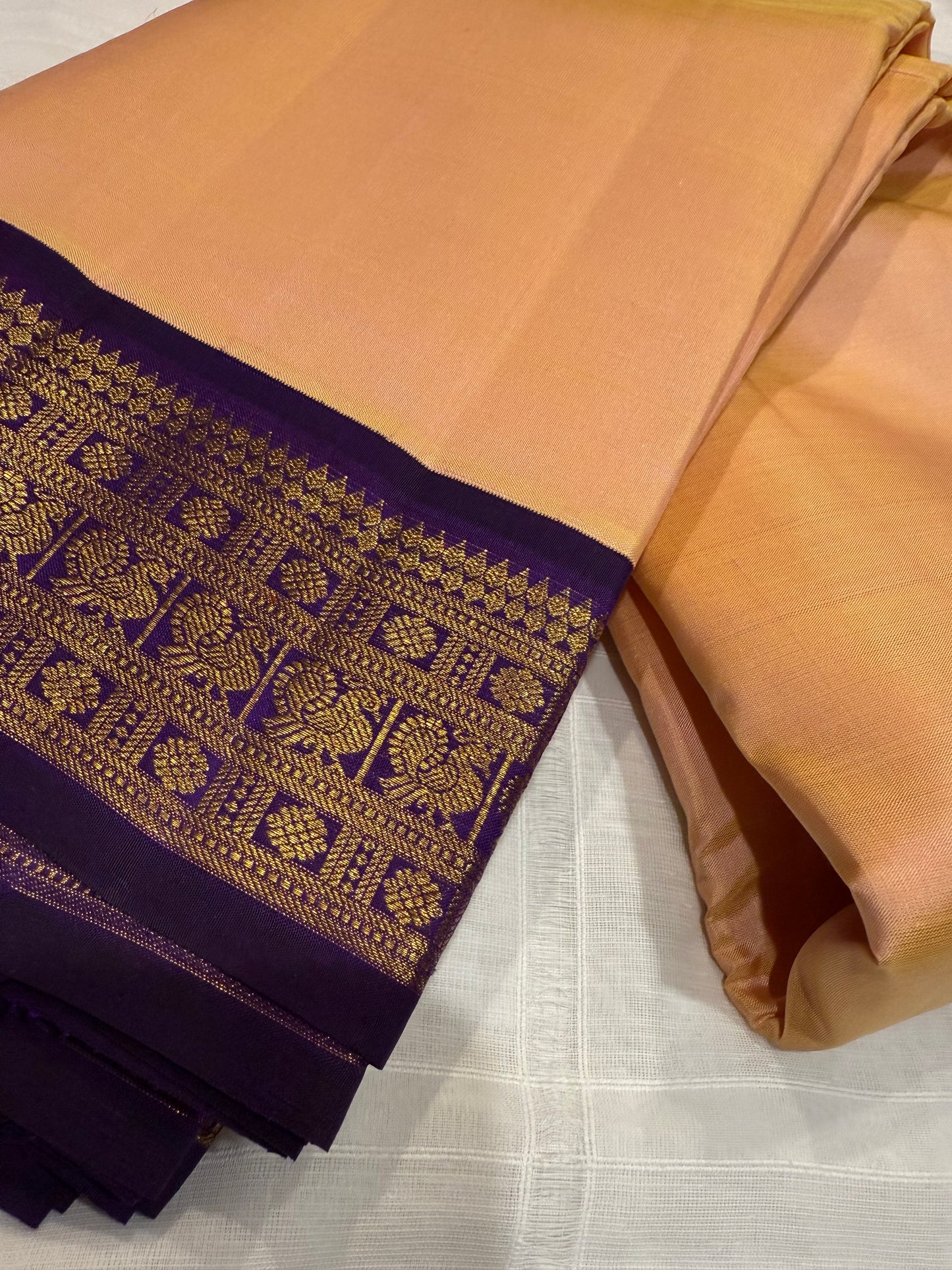 Peach Kanchivaram Silk Saree with Royal Purple Zari Border