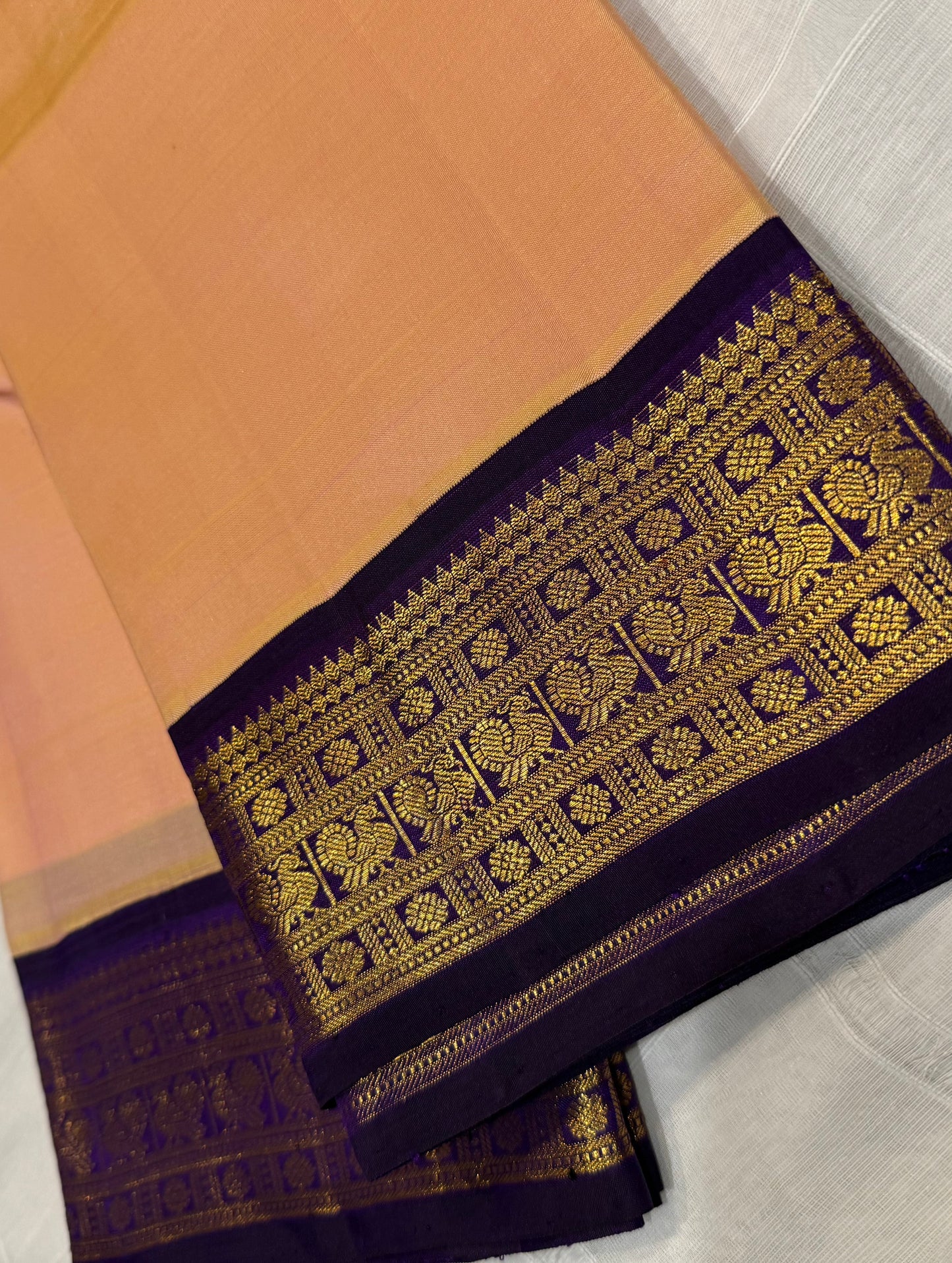 Peach Kanchivaram Silk Saree with Royal Purple Zari Border