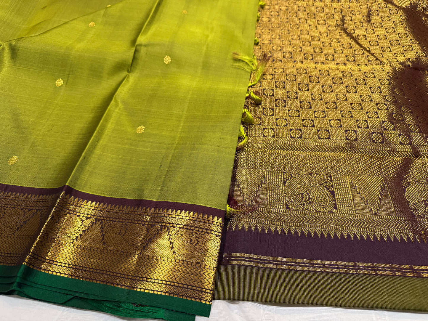 Olive Green Kanchivaram Silk Saree with Coffee Brown Zari Border