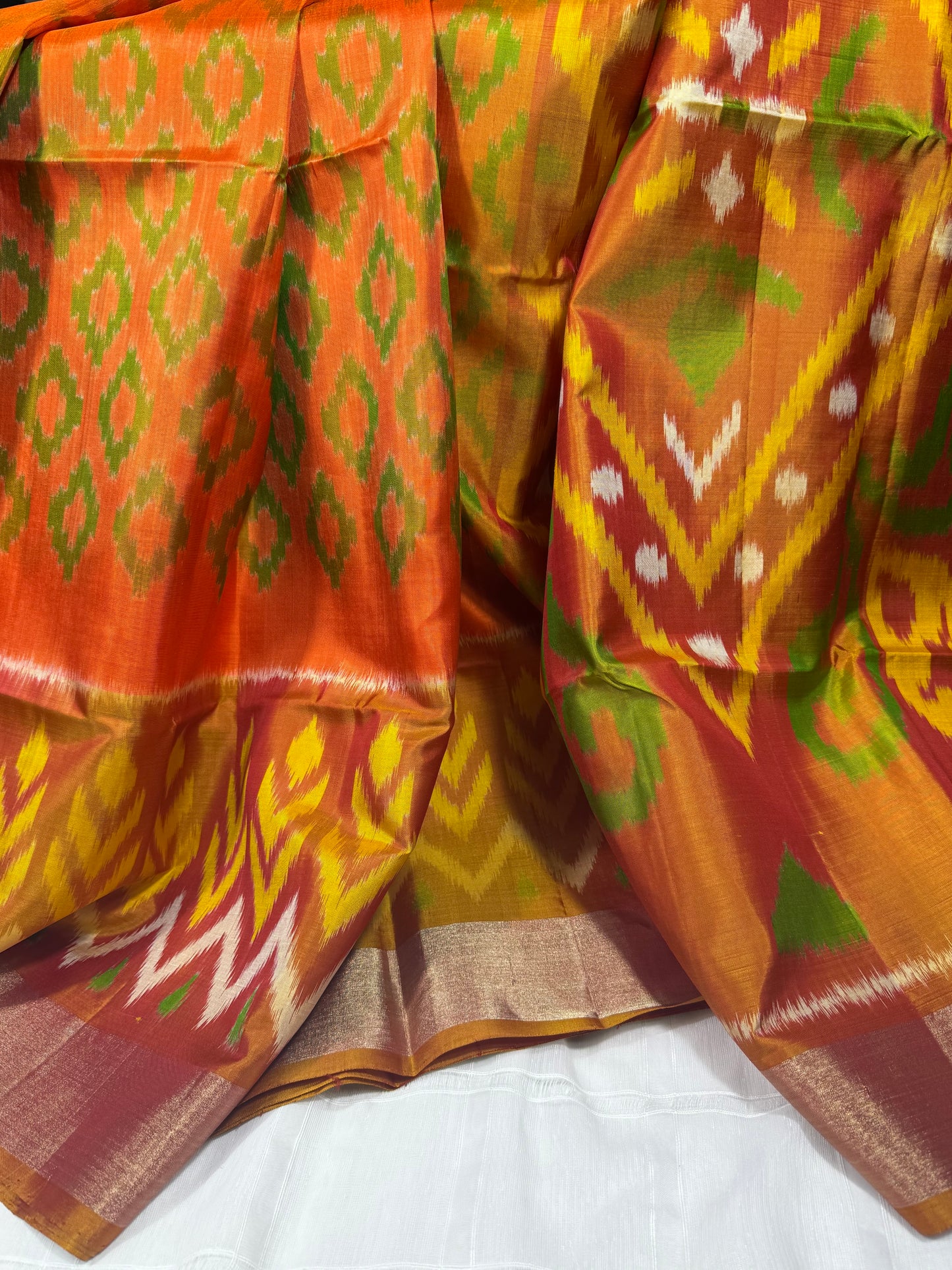 Orange Ikat Silk Saree with Mustard Pallu