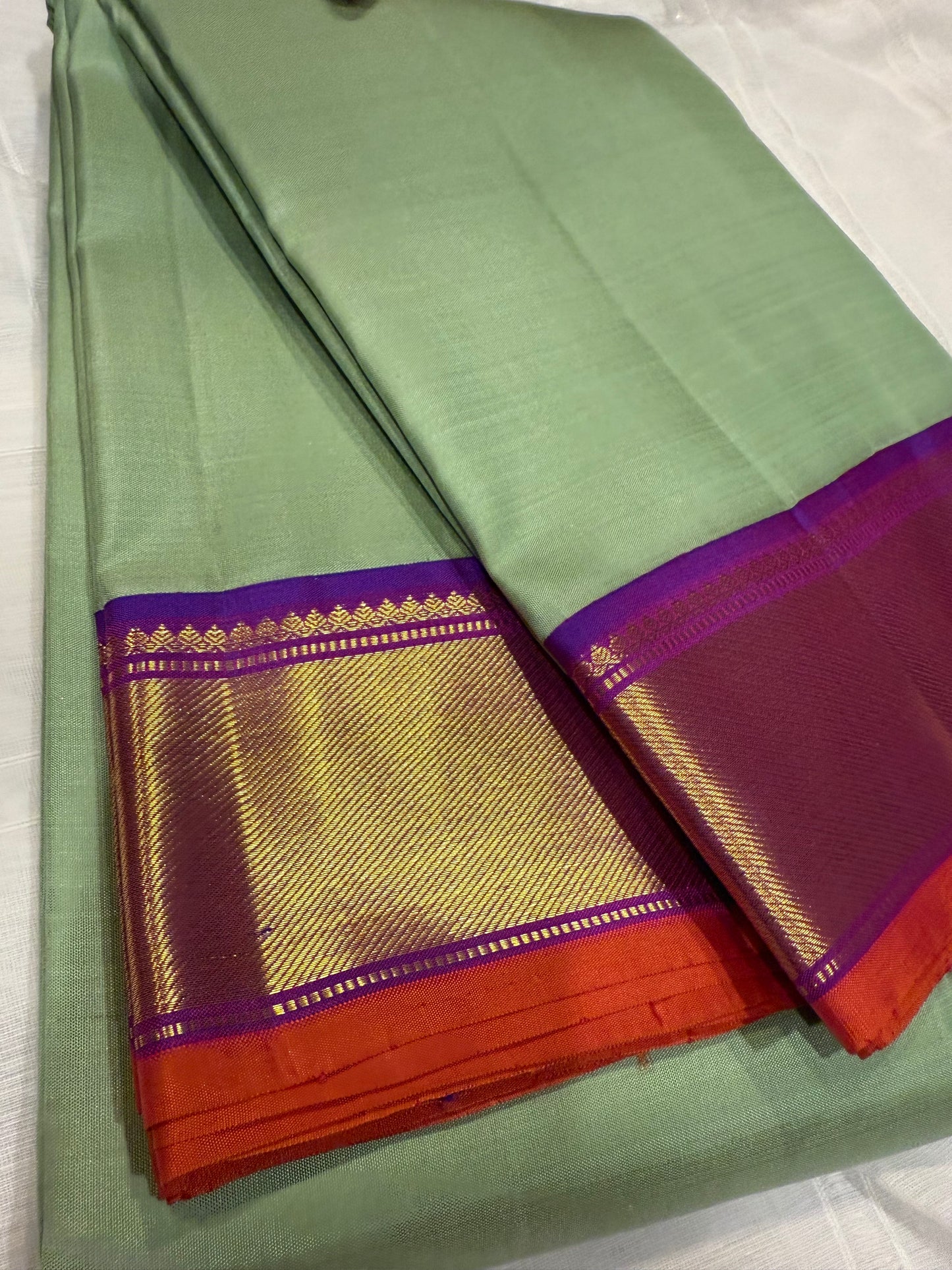 Sage Green Kanchivaram Silk Saree with Purple & Orange Zari Border